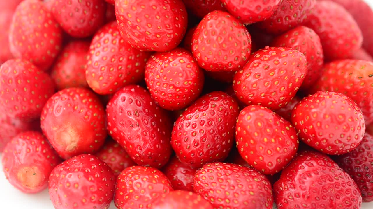 Shooting of strawberry. Shooting in the movement