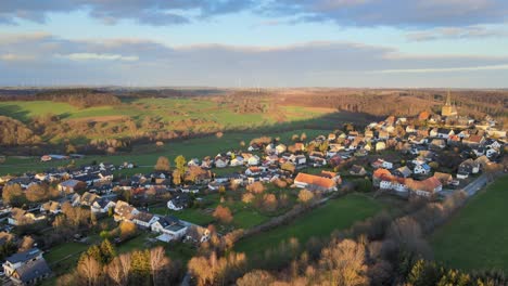 winter sunset in kallenhardt: aerial view of the town in the beautiful sauerland, germany