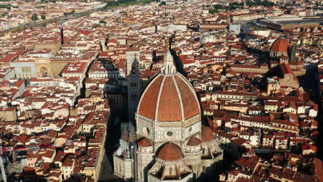 sunrise over florence and cathedral, aerial tilt shot