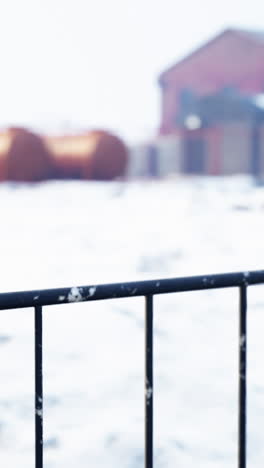 snowy winter landscape with fence