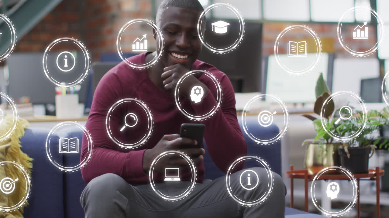 Animation of connections with icons over african american businessman in office