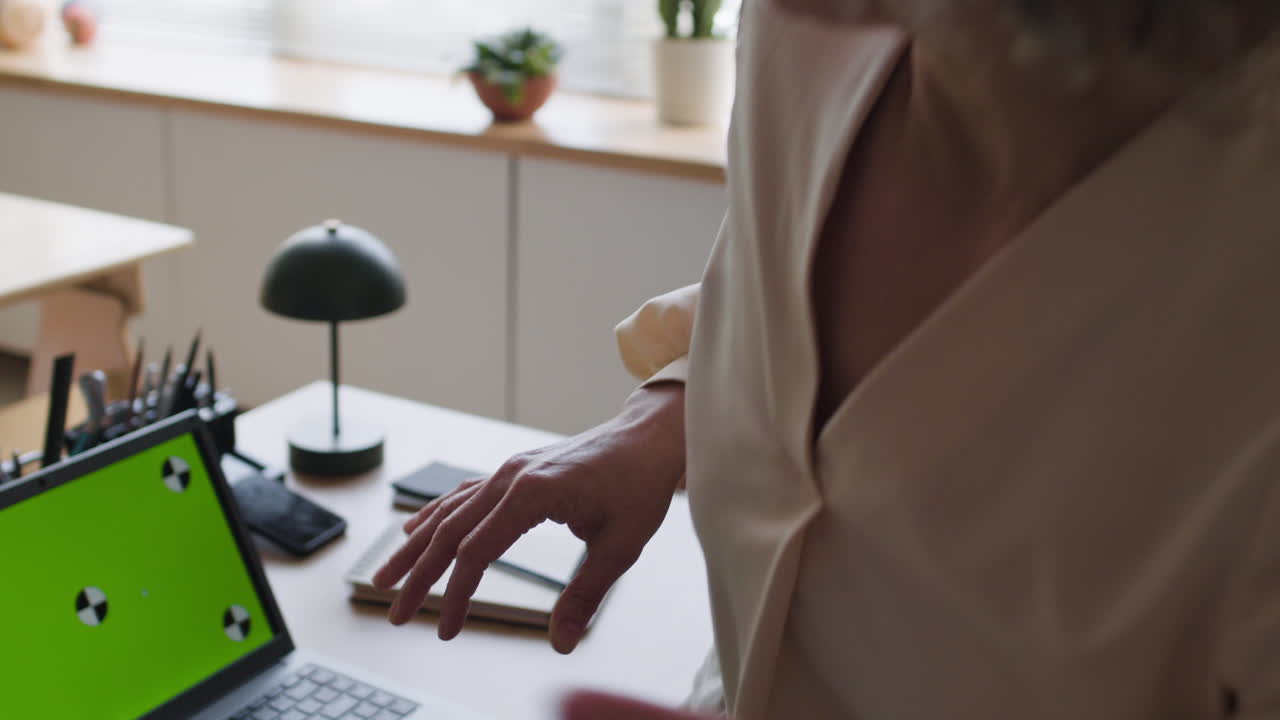 Woman having a video call on a laptop