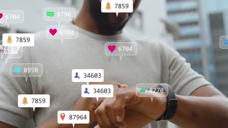 Animation-Von-Social-Media-Symbolen-über-Dem-Mittleren-Teil-Eines-Afroamerikanischen-Mannes,-Der-Draußen-Eine-Smartwatch-Benutzt