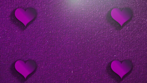 animación primer movimiento pequeños corazones románticos sobre fondo brillante púrpura del día de san valentín