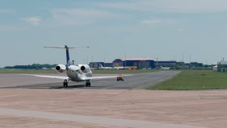 ph-dws ace - air charters europe erj-135lr at the taxiway of the airport in budapest. - wide shot