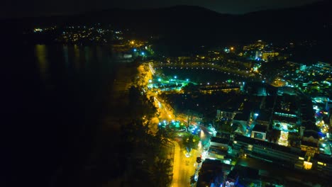 night illuminated phuket island beach town traffic road circle aerial panorama 4k time lapse thailand