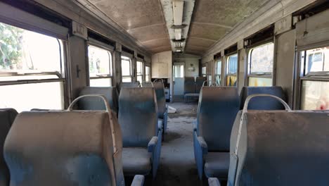 Interior-Of-Abandoned-Train-In-Peloponnese,-Greece---Handheld-Shot