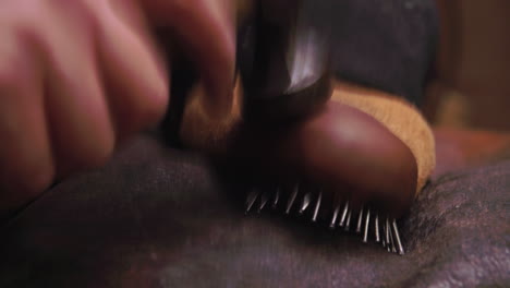 Bespoke-Shoemaker-Pinning-Leather-Together-To-Make-Shoe