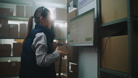 warehouse worker scanning packages