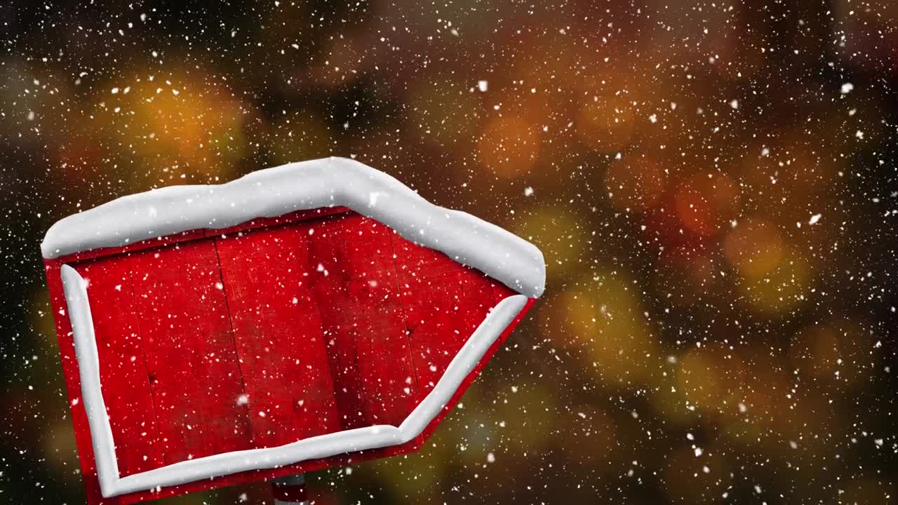 검은색 바에 빛의 갈색 반점에 대한 빨간색 나무 표지판 위에 내리는 눈의 디지털 애니메이션