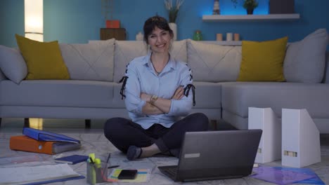 Home-office-worker-woman-makes-a-trust-sign-to-the-camera.