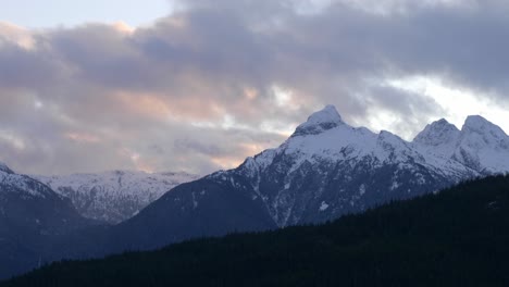 Sunset-Clouds-Over-Snow-capped-Mountains.-Static-Shot