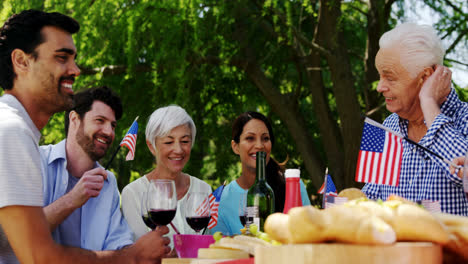 Happy-family-having-meal-on-dinning-table