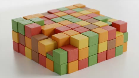 a vibrant and intricately arranged structure made from colorful building blocks demonstrating creative design and spatial configuration