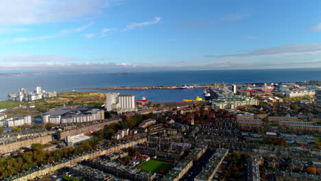 aerial push in shot over pilton, edinburgh, looking towards the firth of forth and the north sea