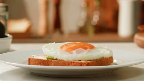 fried egg on toast with avocado