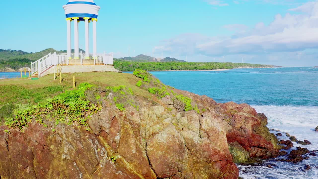Aerial flight over rocky promontory of Puerto Plata, Dominican Republic