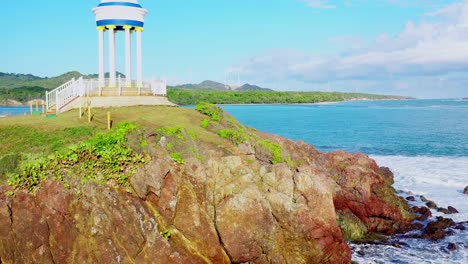 aerial flight over rocky promontory of puerto plata, dominican republic