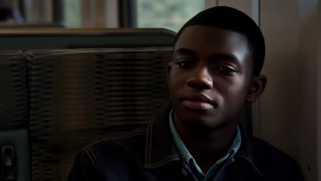 young man on public transportation