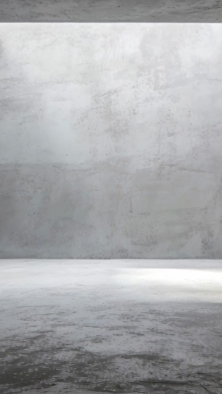 Vertical video: Flashing studio showing bright band moving from light shift, on worn concrete floor