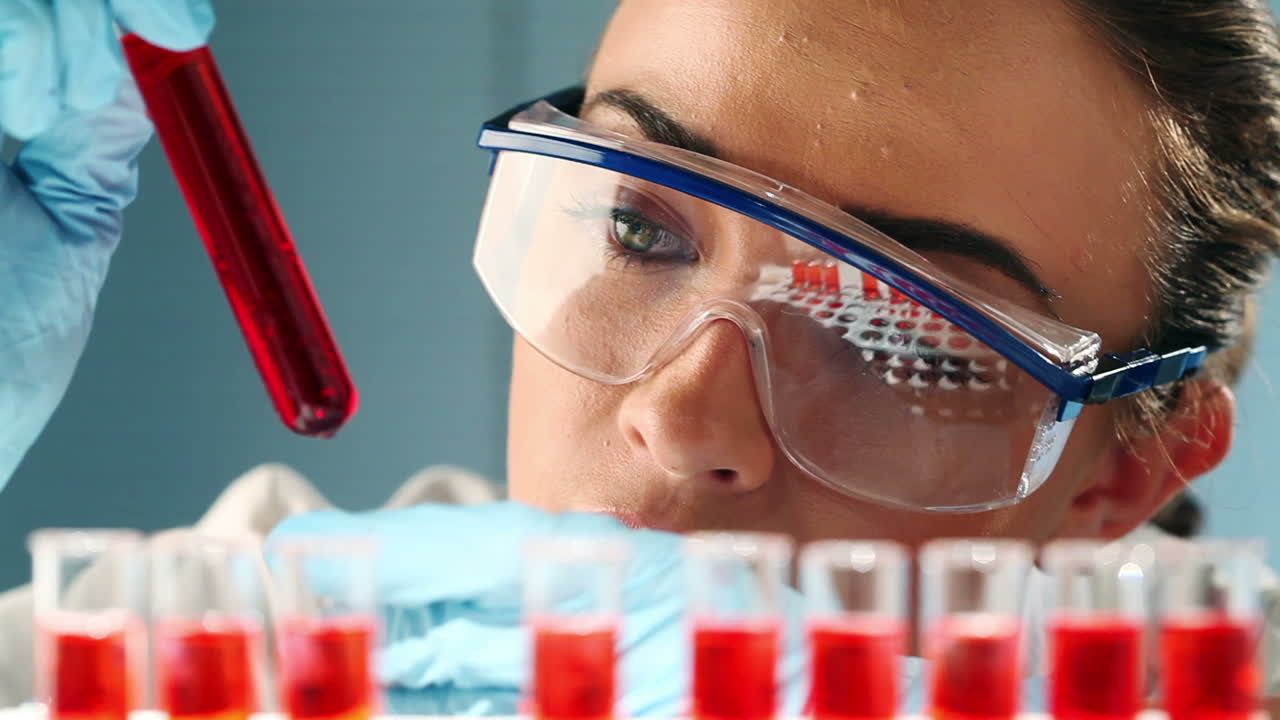 Cute science woman doing medical research