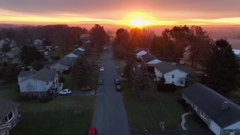 aerial establishing shot of american homes in usa at sunrise