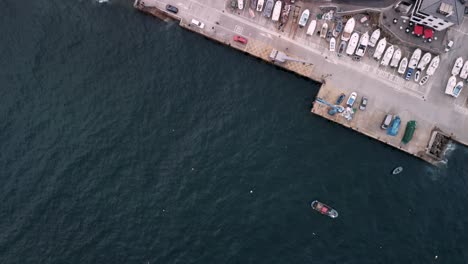 Recreational-Boats-At-The-Yard-In-Caion-Beach-Harbour-In-Coruna,-Spain