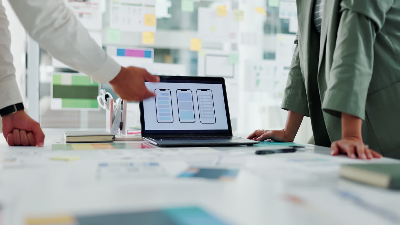 Team Discussing Mobile App Design in a Modern Office