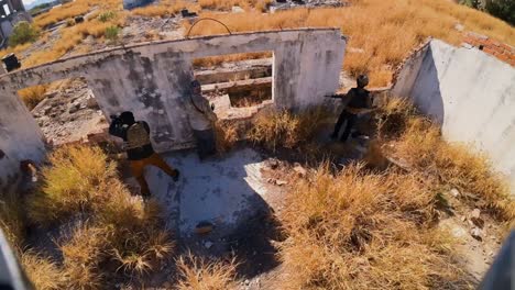 airsoft warfare taken from a drone in a place of ruins