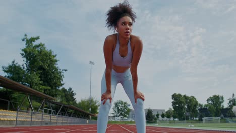 woman taking a break after running