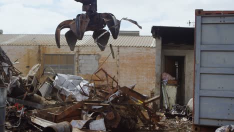 excavator machine being operated in the junkyard 4k