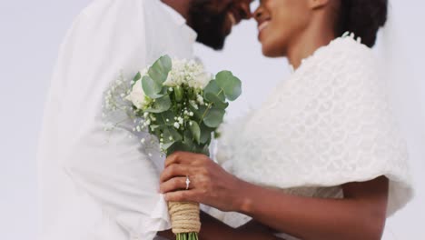 African-american-couple-in-love-getting-married,-smiling-and-dancing-on-the-beach