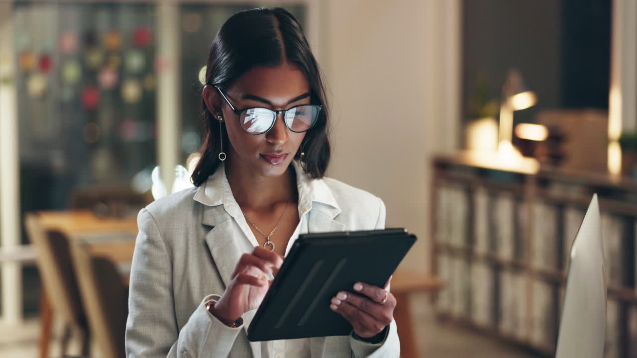 Tablet, overtime and businesswoman in office