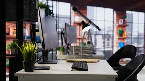 empty startup office with pc on desk to be used by programmers