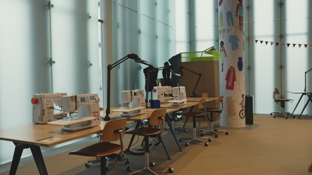 A bright and modern library workspace with study desks, bookshelves, and an inviting atmosphere for learning.