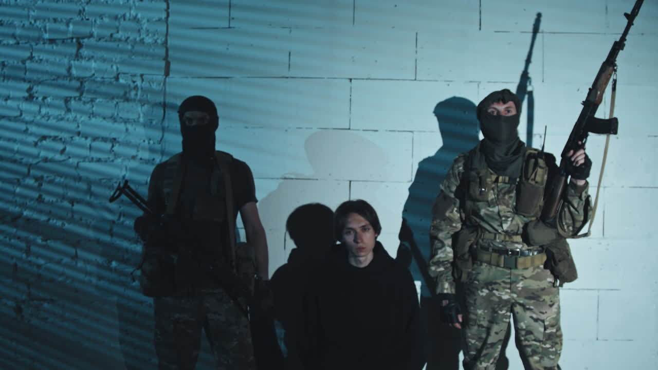 Portrait of Young Male Hostage