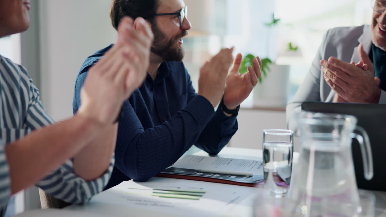 Business meeting with applause