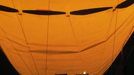 hot air ballon filling up with hot air for lift off. air travel for the tourist .filling up with hot air,gas power