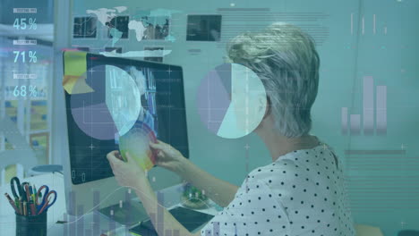 analyzing x-ray with animation overlay, medical professional in hospital setting
