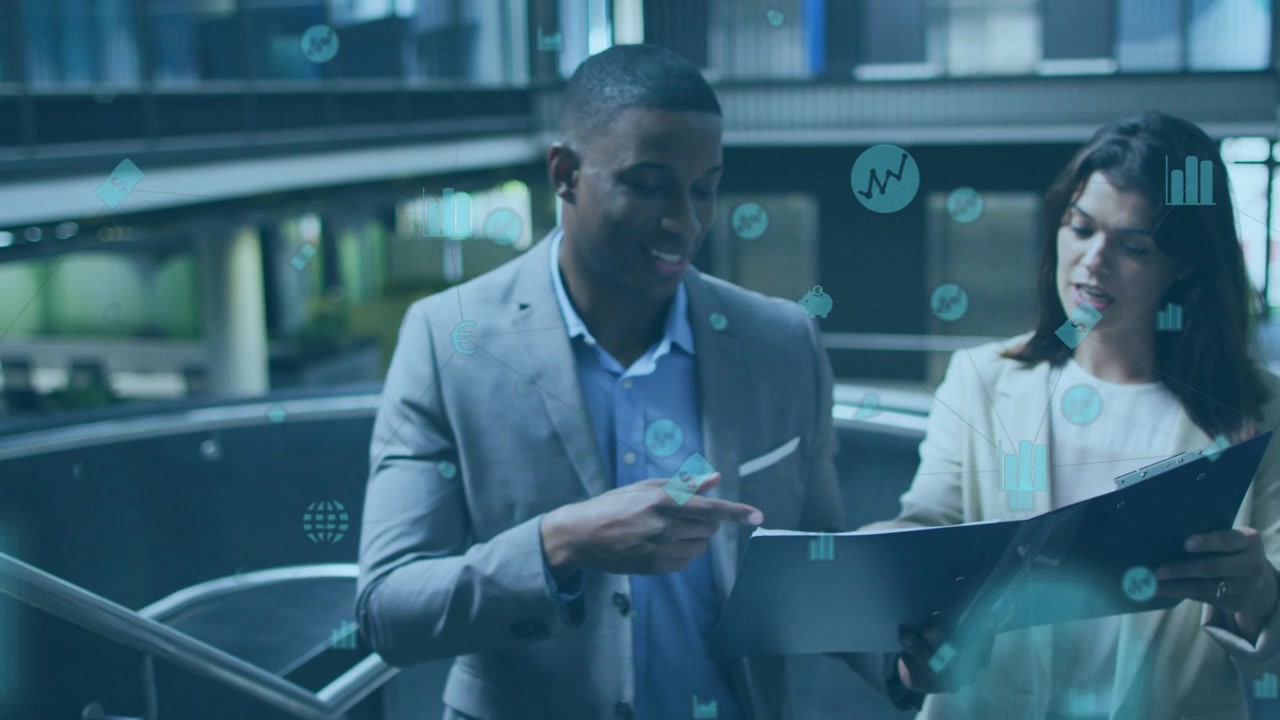 Team walking along railing pointing binder, sparking finance charts reviewing pages, camera closing