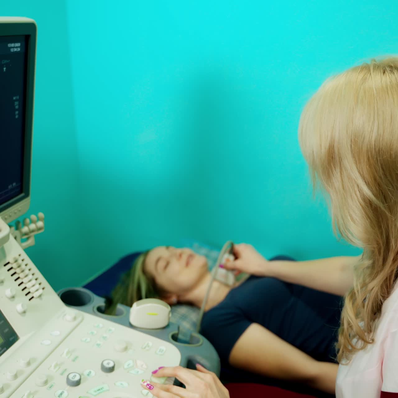 Doctor checkup and scanning thyroid gland. ?octor examining girl throat with special equipment
