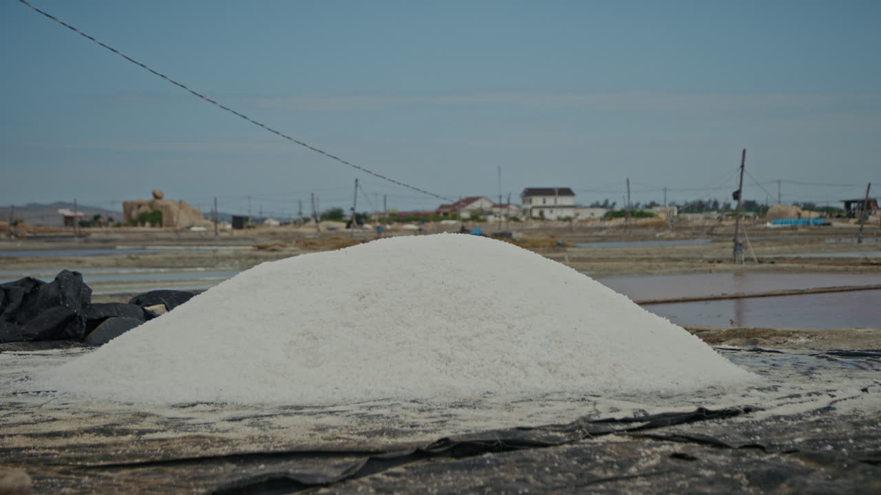 Large pile of white salt in a salt field
