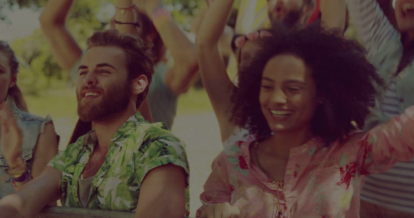 Curly woman shouting, clapping at offscreen marketing event, animated confetti accenting wristbands