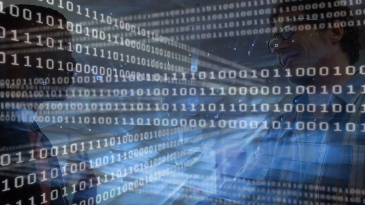Binary flow sweeping, revealing data, two colleagues leaning at laptop in tech office for work