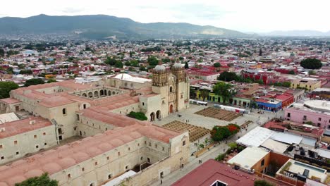 Aerial-circle-shot-of-the-beautiful-Cathedral-of-Santo-Domingo-in-Oaxaca-de-Juarez,-Mexico