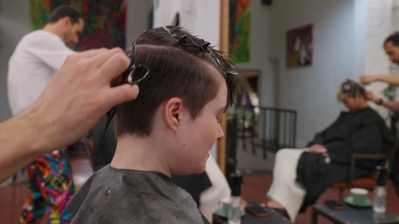 Haircut in progress at a hair salon