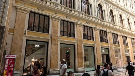 crowds strolling through historic shopping gallery