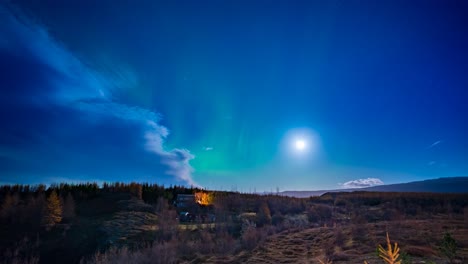 northern lights, aurora borealis time lapse during a full moon near egilsstadir, iceland
