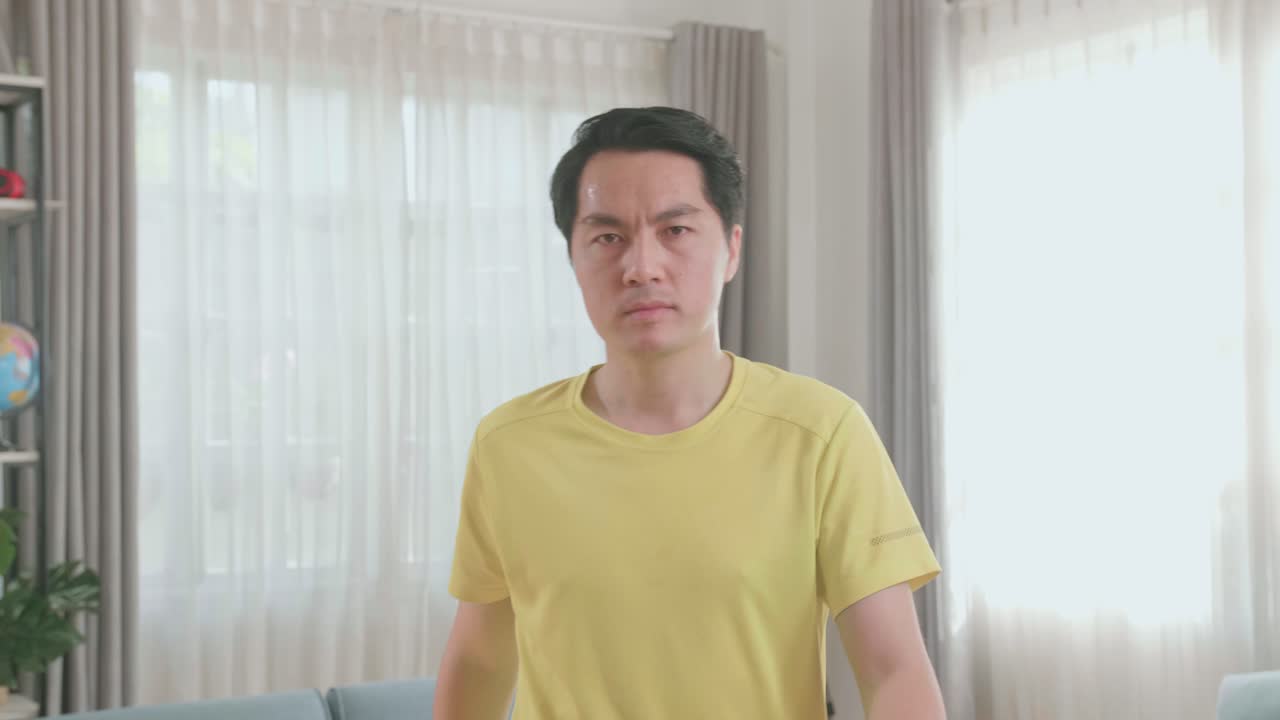 Asian Man with a Serious Expression