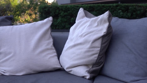 pillows with outdoor patio deck and sofa